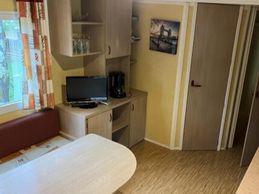 Mobilhome 3 personnes - Mobil-home Standard 23.4m² 2 chambres + terrasse couverte 10m² - TV 1/3 pers 1