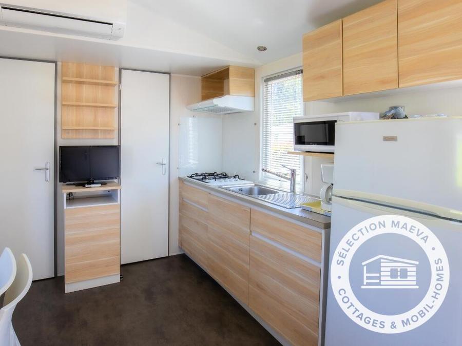 Mobilhome 6 personnes - Confort 4 Pièces Climatisé + TV 1