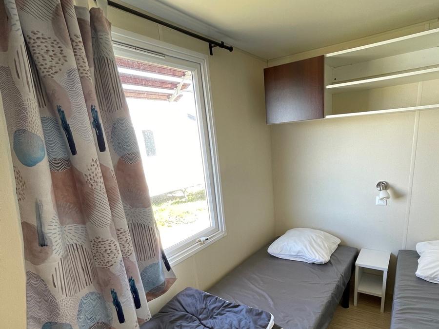 Mobilhome 4 personnes - 26m² + Terrasse bois intégrée de 7m². 4 pers 12