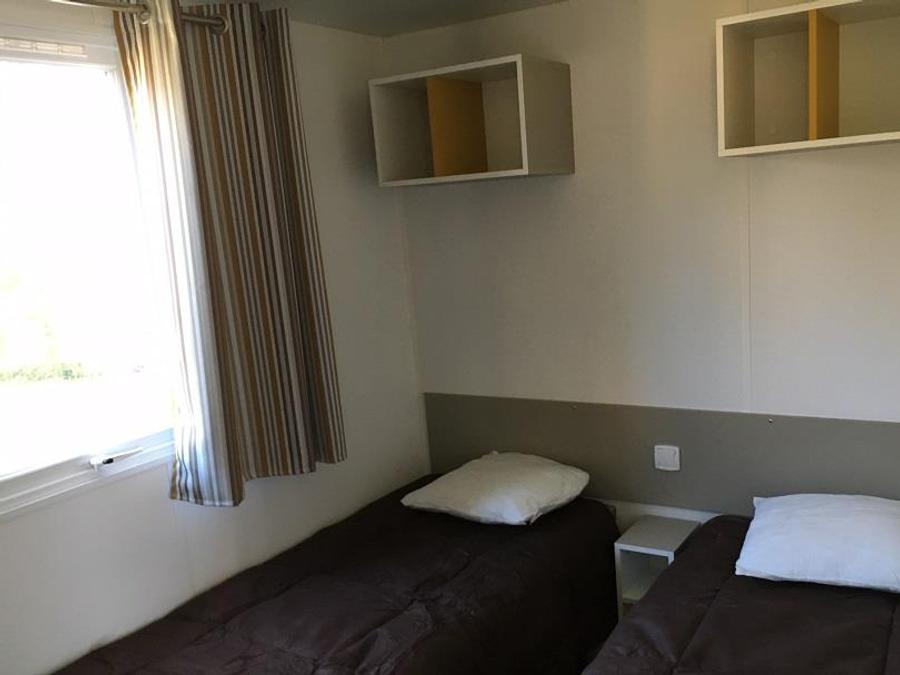 Mobilhome 4 personnes - Confort 24 m² / 2 chambres - terrasse 4