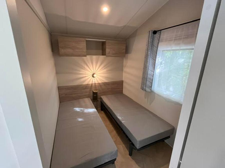 Mobilhome 4 personnes - Mobilhome 31 m² 2 chambres n° 80 Terrasse couverte, climatisé, 2/4 Pers Samedi - Samedi 4