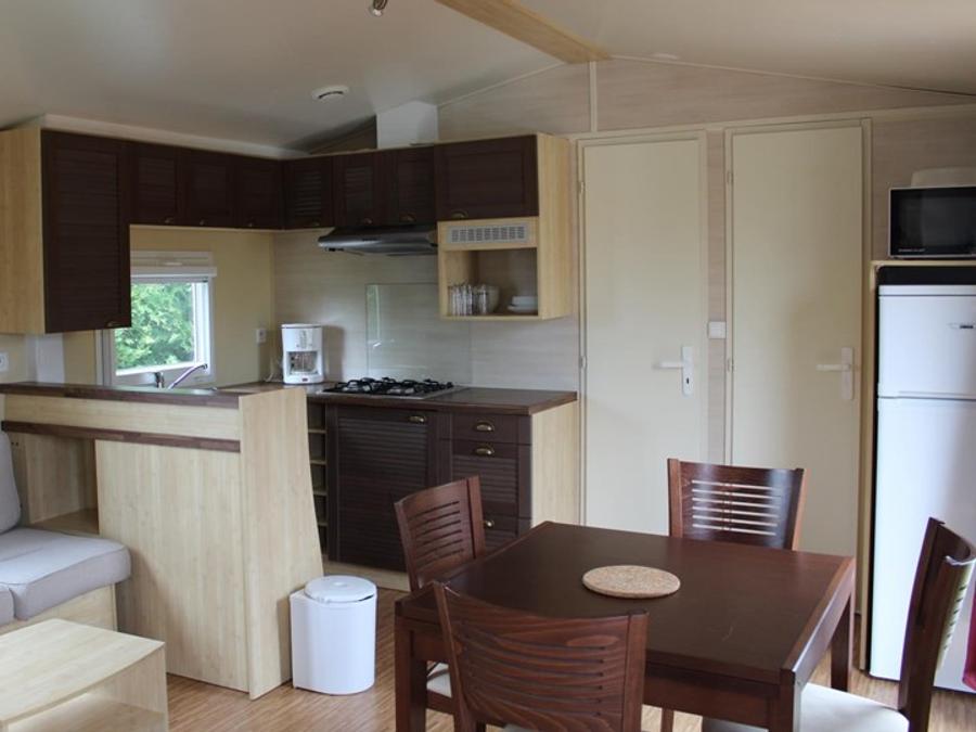Mobilhome 4 personnes - Mobil-home Confort 23m² - 2 chambres + Terrasse semi-couverte 9m² 4 pers 1