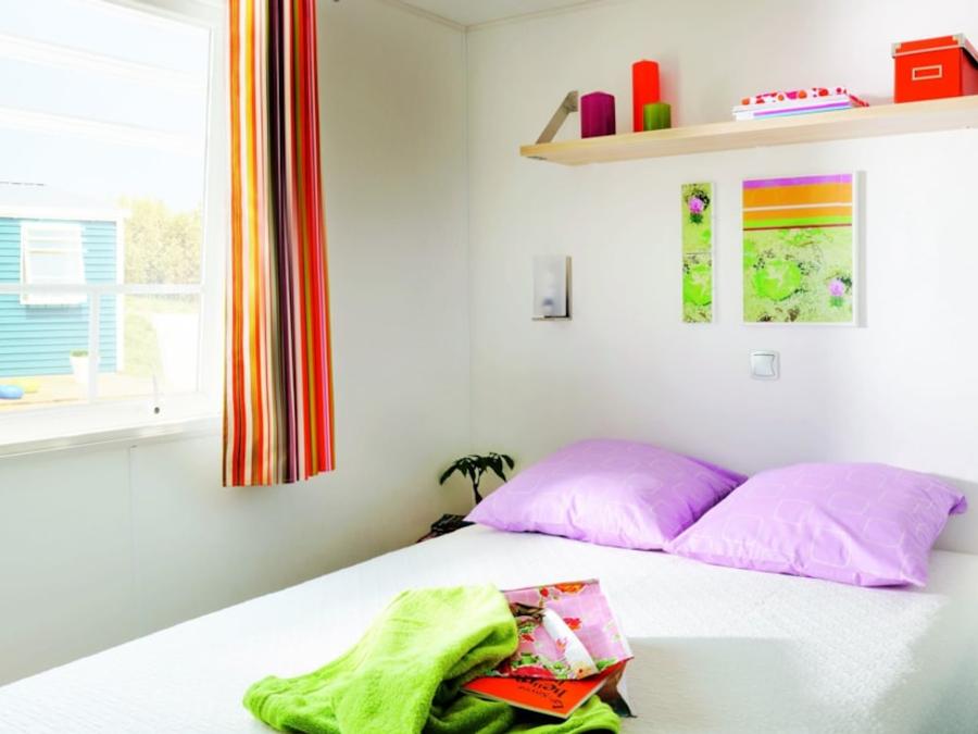 Mobilhome 4 personnes - Confort 26m² 2ch 4 personnes + terrasse semi couverte (coté plage) 3