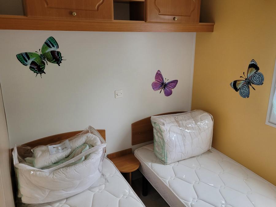 Mobilhome 4 personnes - Confort Supérieur 4p (32m²) avec terrasse couverte, 2 chambres, climatisé 7