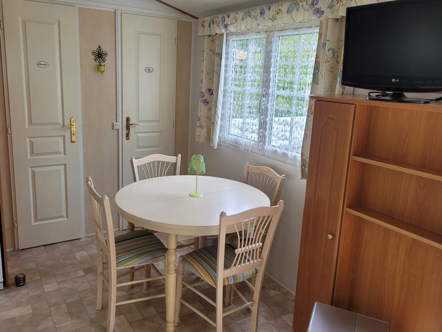 Mobilhome 4 personnes - Confort Supérieur 4p (32m²) avec terrasse couverte, 2 chambres, climatisé 4