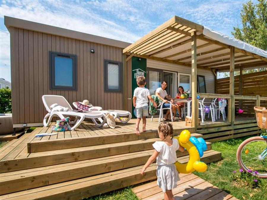 Mobilhome 4 personnes - Homeflower PREMIUM 29m² (2 chambres) + CLIM + terrasse semi-couverte + TV + draps + serviettes | 4 personnes 0