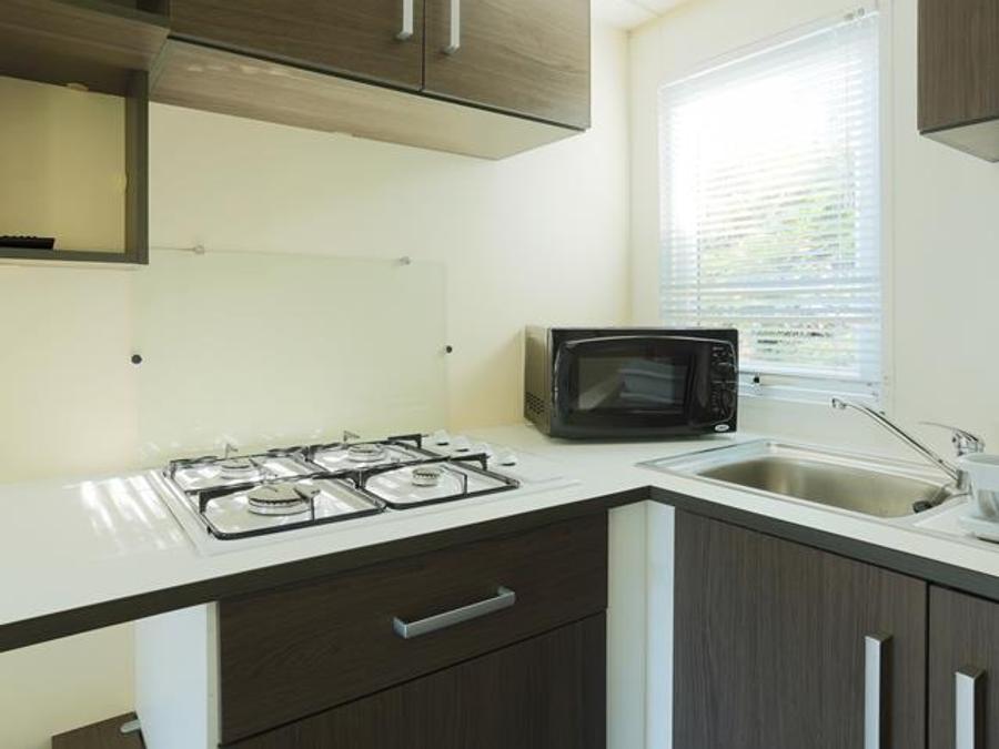 Mobilhome 2 personnes - Mobil-home Plage 18.6m² (+ de 10 ans) (1 chambre) + Terrasse bois semi-couverte + TV 2 pers 7
