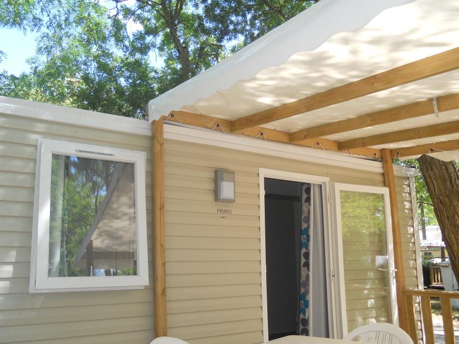 Mobilhome 2 personnes - Confort 18m² (1 chambre) + terrasse couverte 9m² + TV | 2 personnes 1