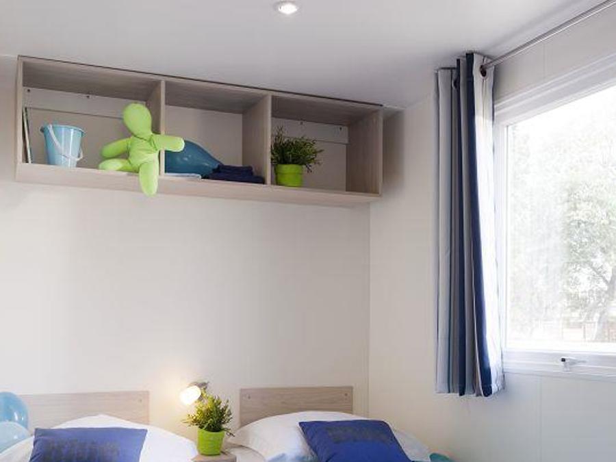 Mobilhome 4 personnes - Standard 25m² (2 chambres) + terrasse 6m² à 10m² + TV | 4 personnes 5