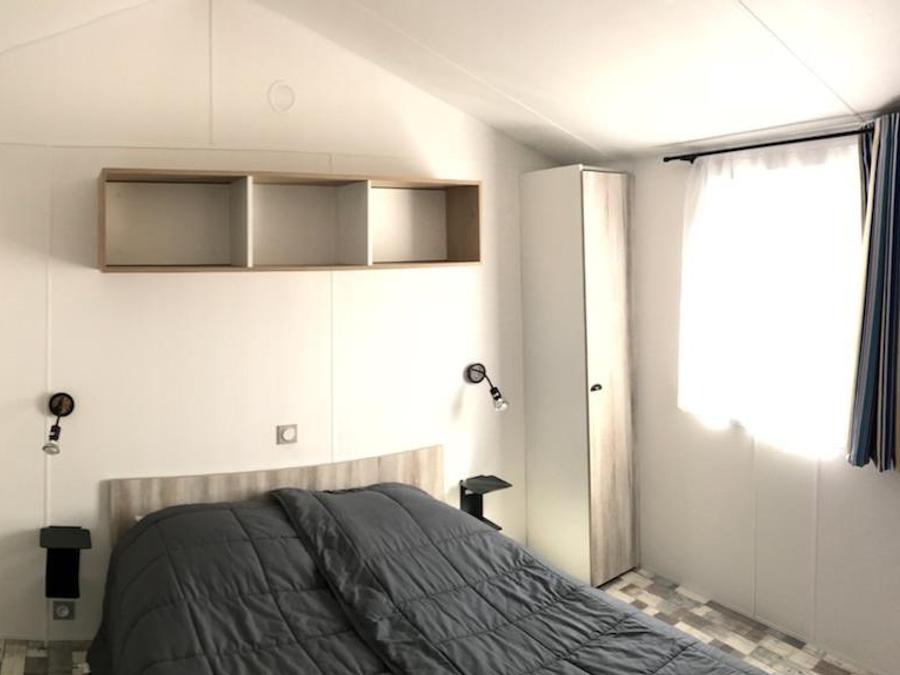 Mobilhome 4 personnes - PMR 31m² - 2 chambres - terrasse couverte (adapté pour personnes à mobilité réduite) - TV 3