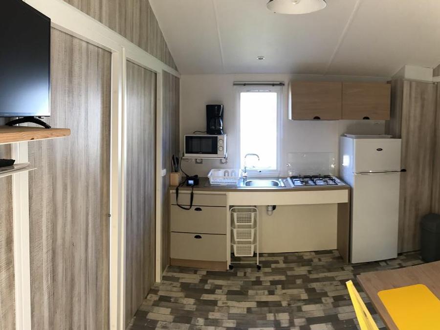 Mobilhome 4 personnes - PMR 31m² - 2 chambres - terrasse couverte (adapté pour personnes à mobilité réduite) - TV 2