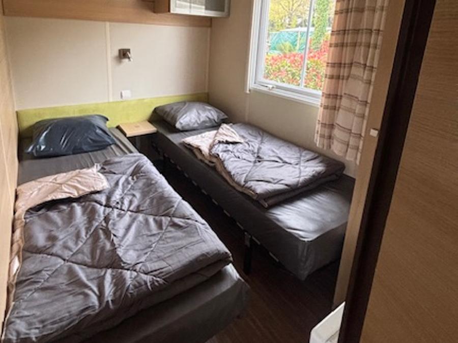 Mobilhome 6 personnes - 3 chambres - terrasse couverte - TV 22