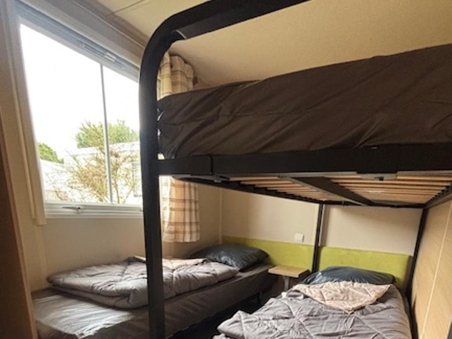 Mobilhome 6 personnes - 3 chambres - terrasse couverte - TV 21