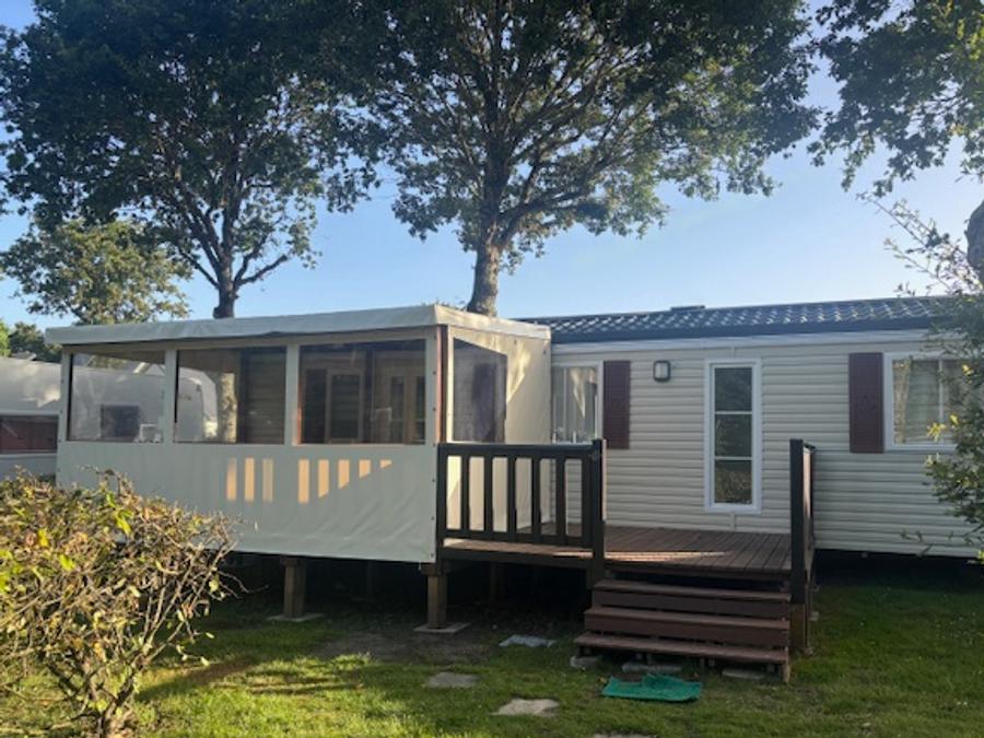 Mobilhome 6 personnes - 3 chambres - terrasse couverte - TV 14