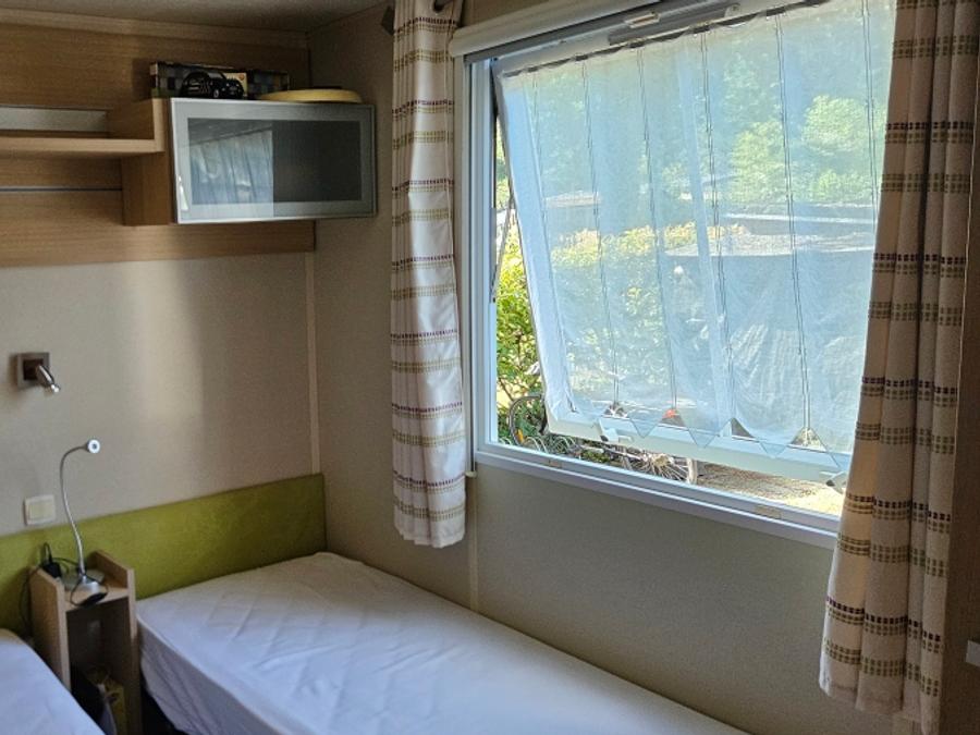 Mobilhome 6 personnes - 3 chambres - terrasse couverte - TV 12