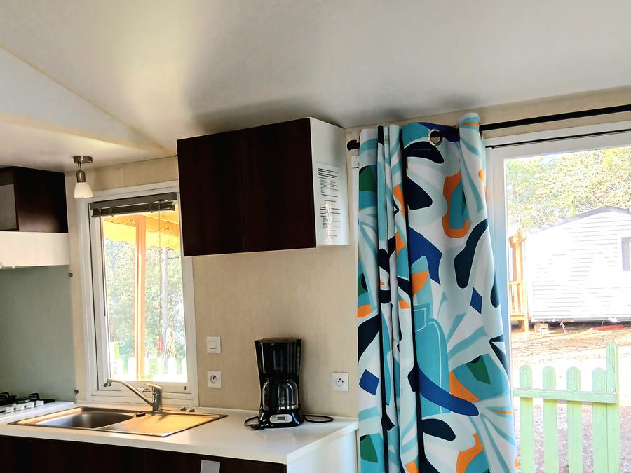 Mobilhome 4 personnes - TOUT CONFORT - 2 chambres avec climatisation et TV - 28 m² 2
