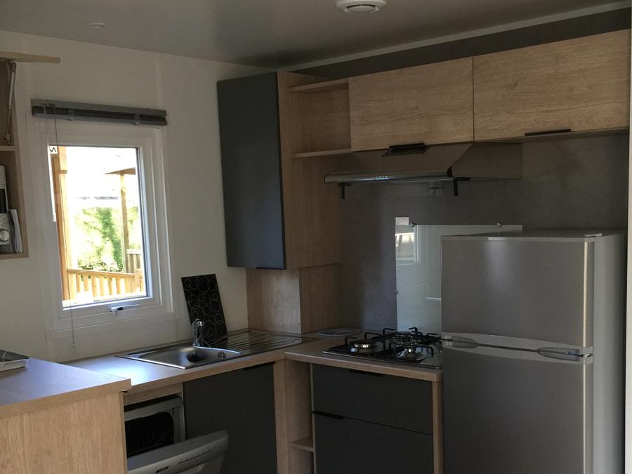 Mobilhome 4 personnes - des Familles 2 CH - 4 PERS 32 m² - TV + CLIM + LV + DRAPS (inclus à la location à la semaine) 3