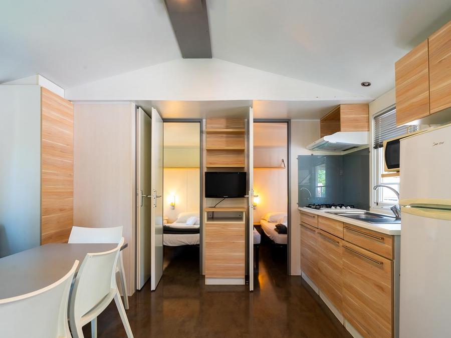 Mobilhome 2 personnes - (2 personnes incluses - 4 personnes supplémentaires possibles avec supplément, veuillez contacter le camping) 12
