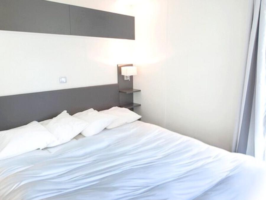 Mobilhome 4 personnes - Premium 40m² 2 chambres + CLIM + TV + terrasse panoramique + draps + serviettes 4