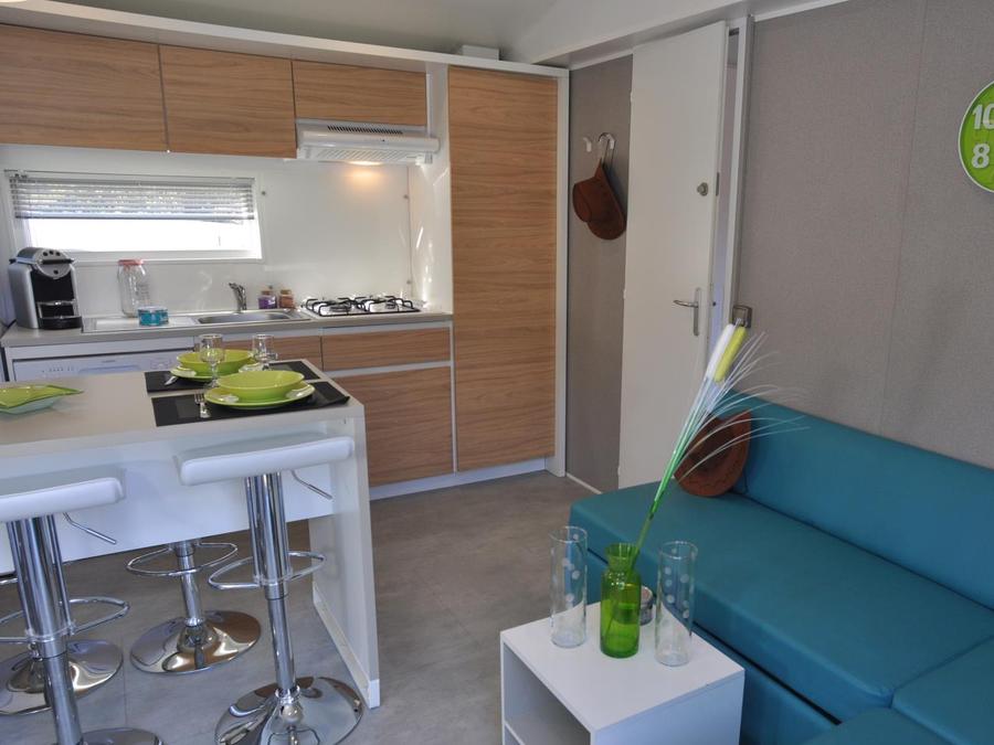 Mobilhome 4 personnes - Premium 2 chambres, climatisation, 2 cabanes trappeur 7