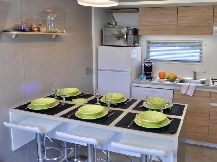 Mobilhome 4 personnes - Premium 2 chambres, climatisation, 2 cabanes trappeur 8