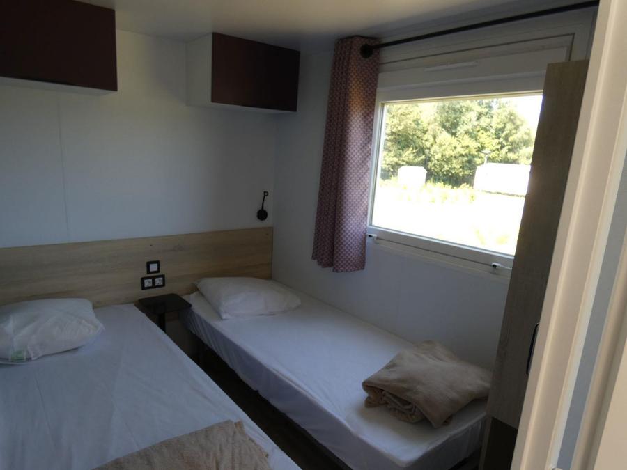 Mobilhome 4 personnes - 2 chambres. 13