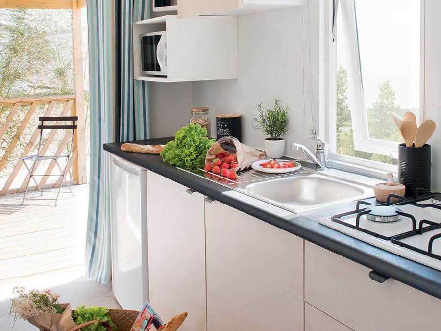 Mobilhome 4 personnes - Confort 22m² 2 chambres + terrasse semi-couverte sur pilotis 0