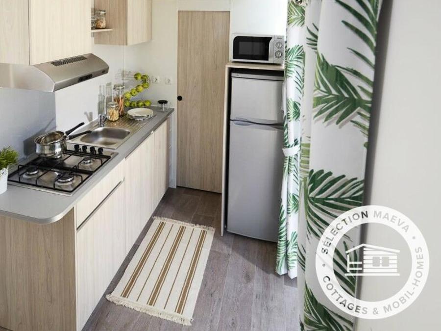 Mobilhome 4 personnes - 3 pièces 4 Personnes Climatisé + TV 2
