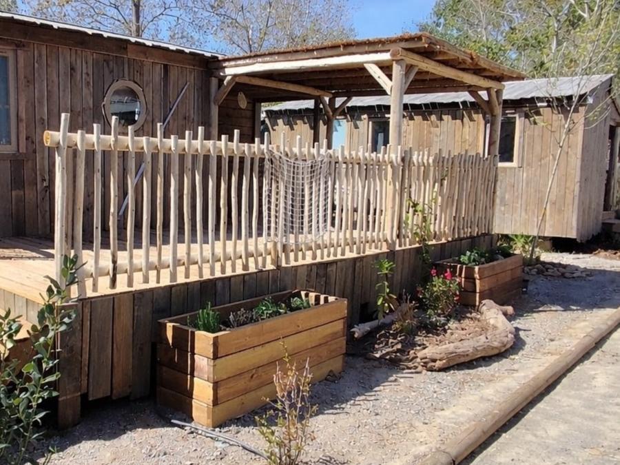 Mobilhome 4 personnes - Éco-cabane 24m² - climatisé - 2 chambres 2