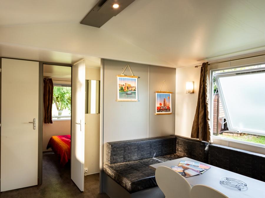 Bungalow 4 personnes - 2 chambres climatisé - 31m2 + terrasse couverte 11