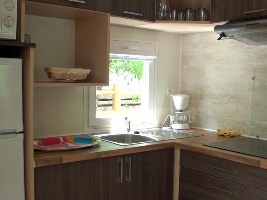 Mobilhome 4 personnes - Résidence PEYRELADE Confort 2 chambres-terrasse couverte + TV 4