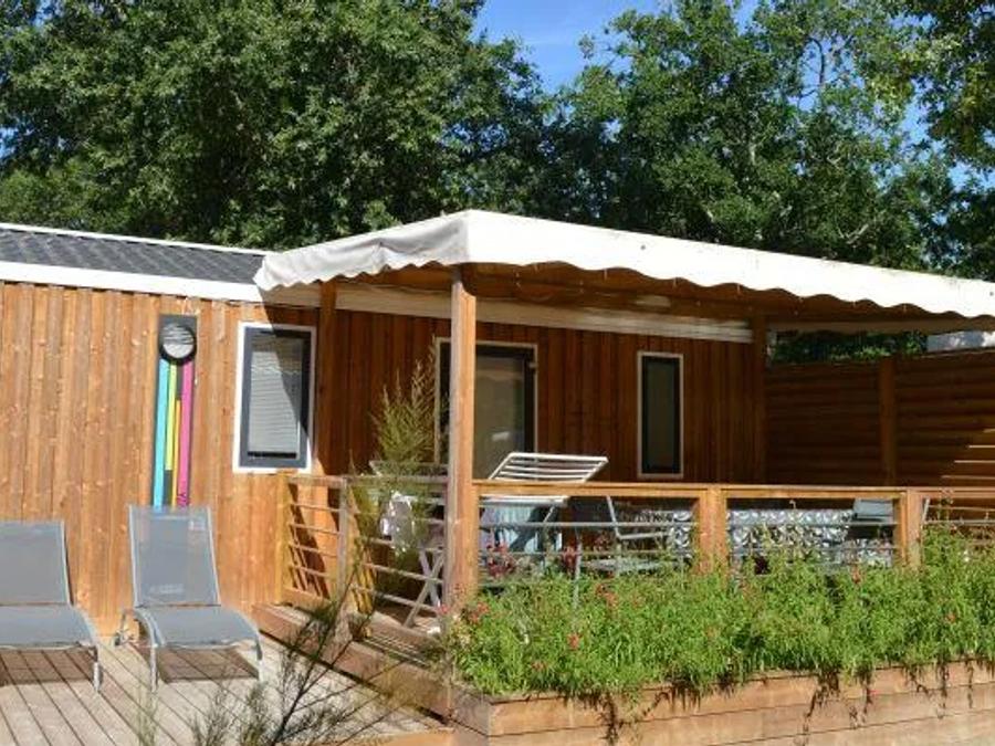 Mobilhome 4 personnes - Mobil-home Bois PREMIUM CLIM 28m² - 2 chambres + terrasse + TV + draps + serviettes inclus | 4 personnes 0
