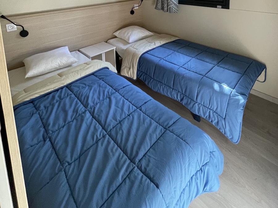 Chalet 6 personnes - Confort 35m² 3 chambres terrasse semi-couverte + climatisation 11