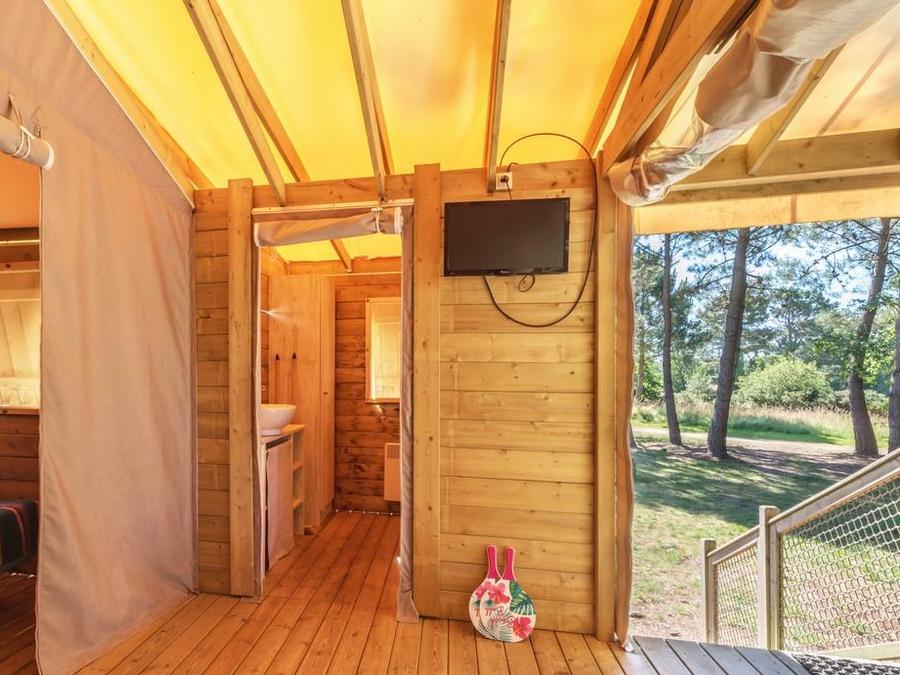 Insolite 5 personnes - INSOLITE 25-2 (Cabane sur pilotis Ecologe) >10ans ; maxi 4 adultes (Lits superposés) TV 5