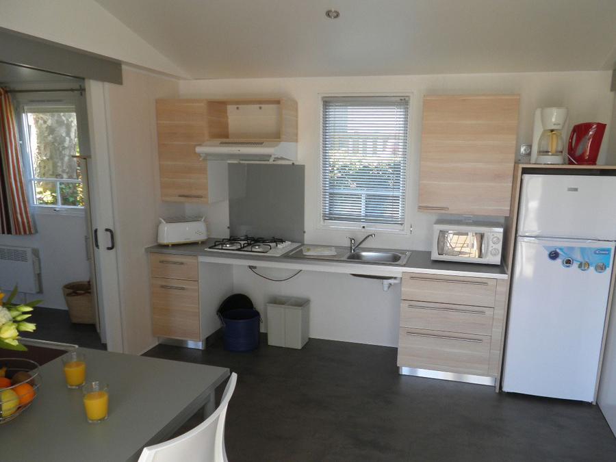 Mobilhome 4 personnes - Standard 32m² - 2 chambres + terrasse non-couverte - PMR 2