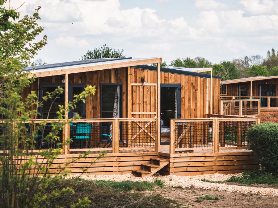 Camping Le Village de Cottages Pôle du Cheval et de l'Ane 3*