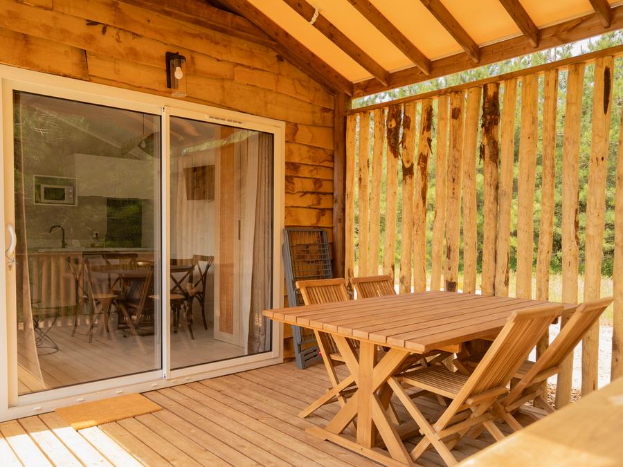 Lodge 4 personnes - Lodge Ethnique (sans spa) 1 chambre + canapé convertible séjour 11